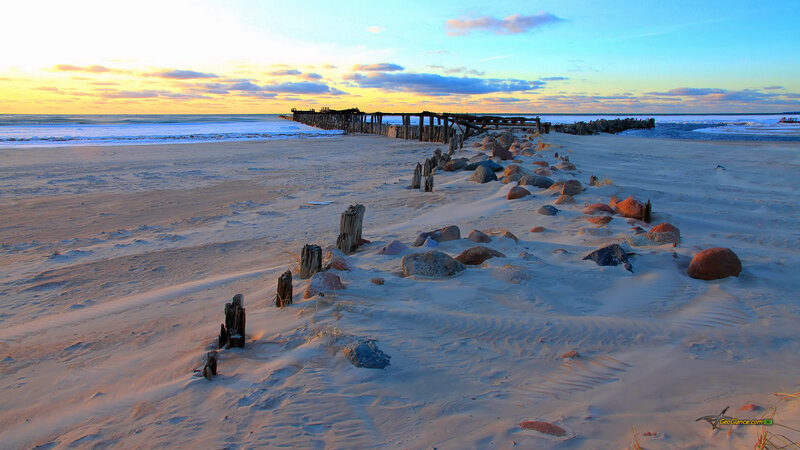 Abandoned Pier on Beach