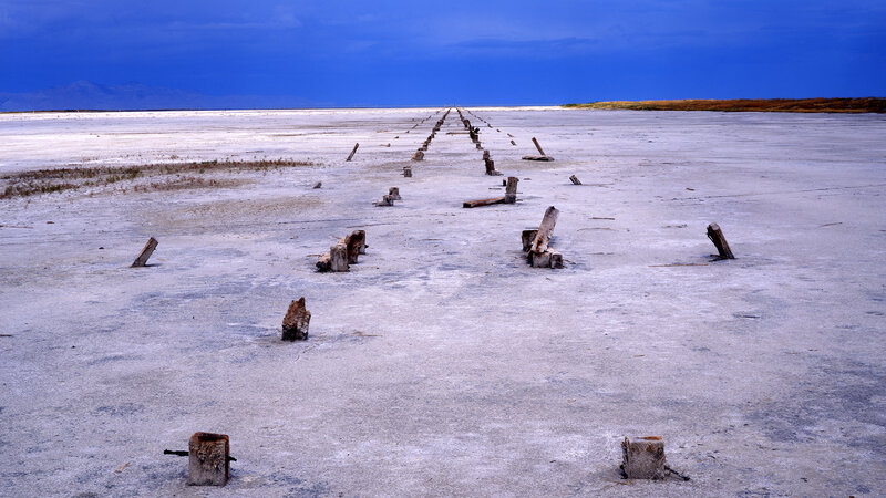 Abandoned pier on salt flat