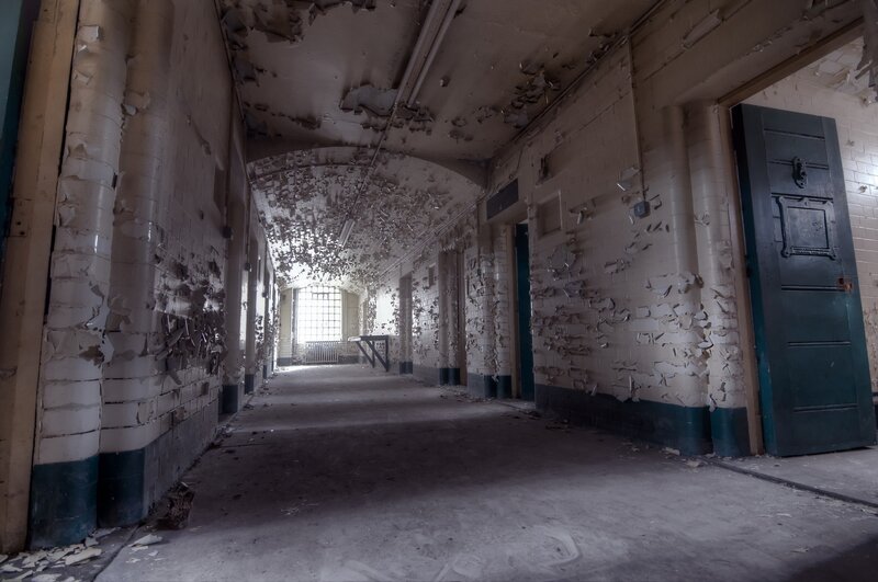 Abandoned Prison Corridor — Gray, Dramatic, Photograph