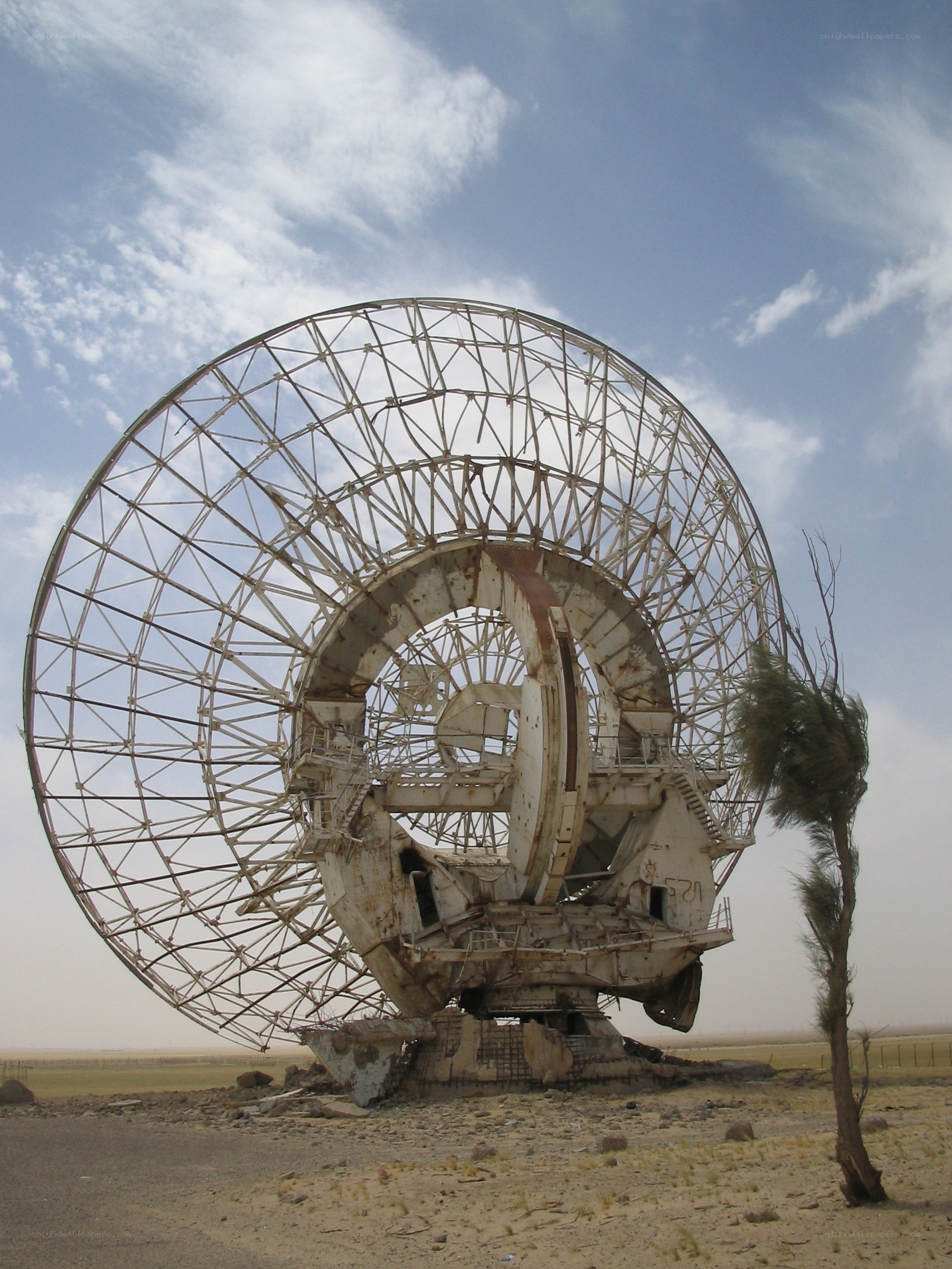 Abandoned radar dish in desert