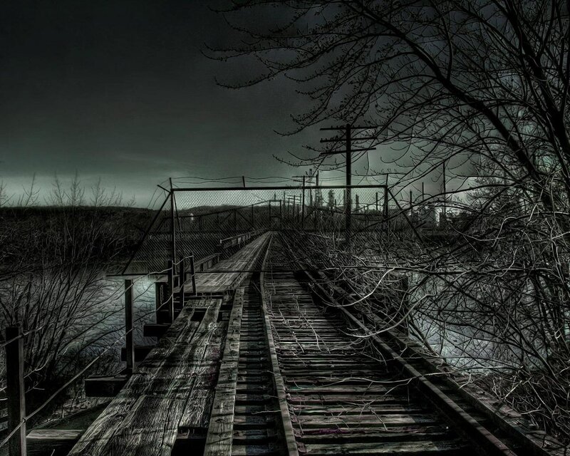 abandoned railway bridge at dusk