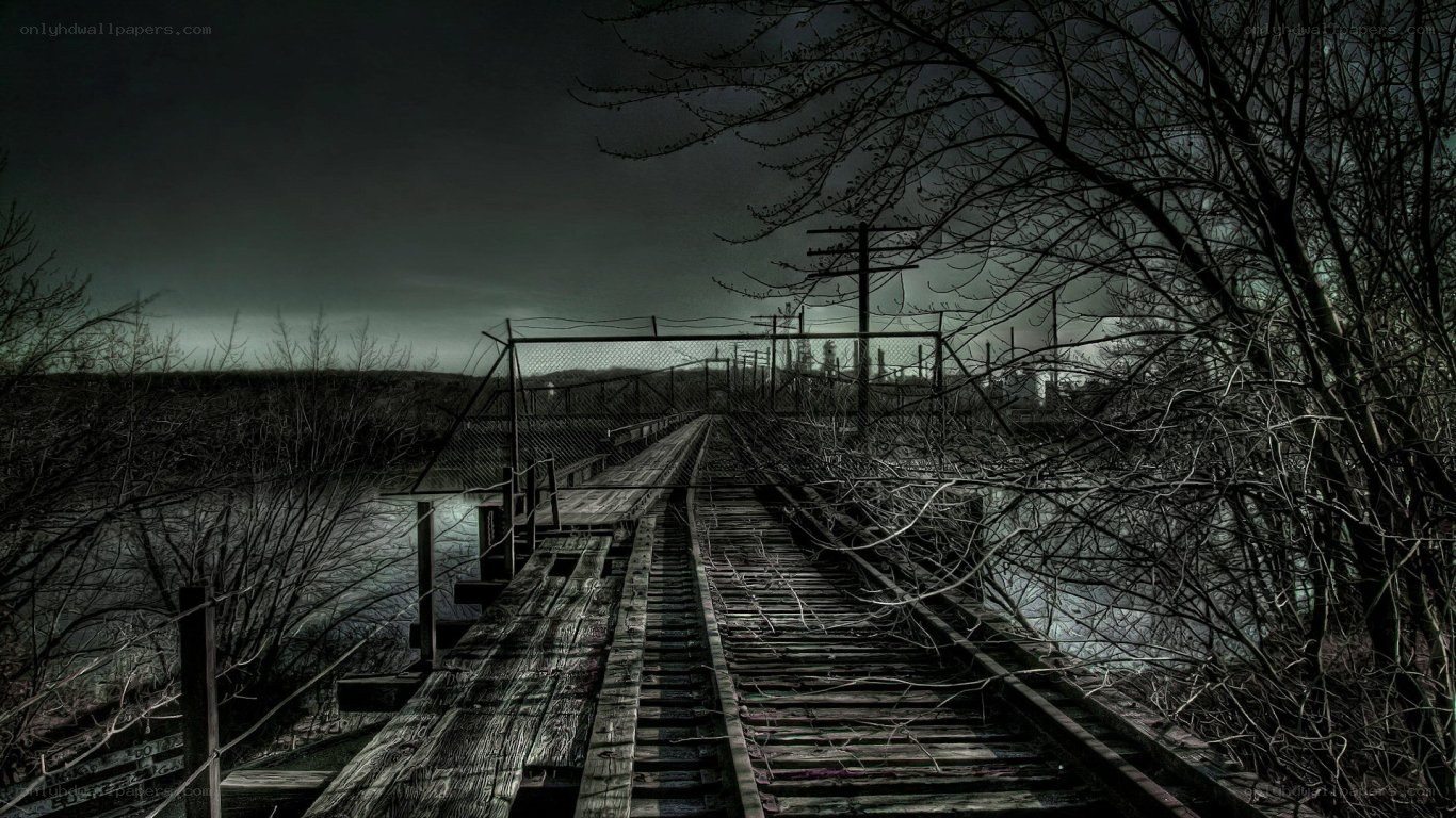 abandoned railway bridge at night