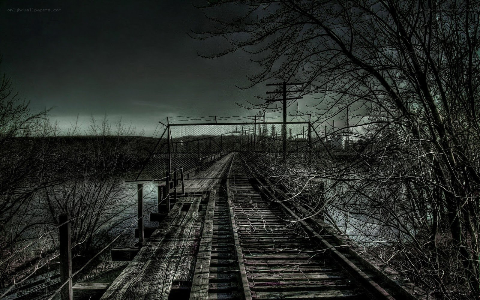 abandoned railway bridge at night