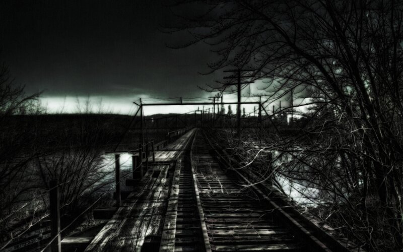 abandoned railway bridge at night
