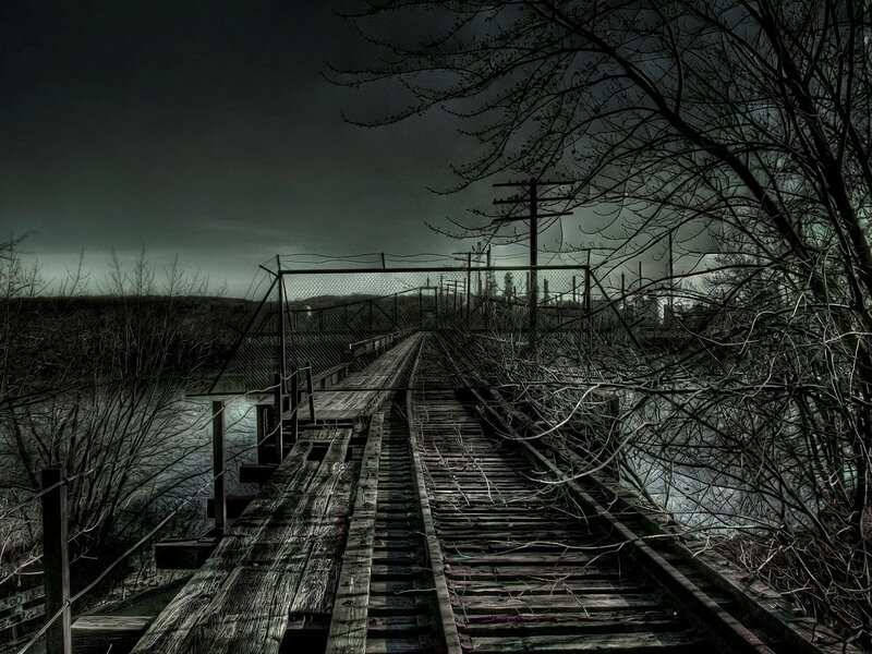 abandoned railway bridge at night