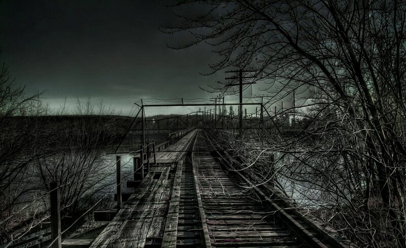 abandoned railway bridge at night