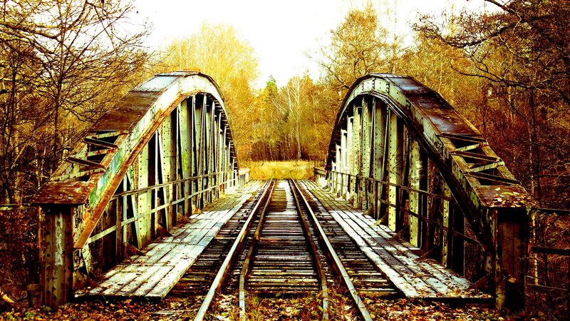 abandoned railway bridge in autumn