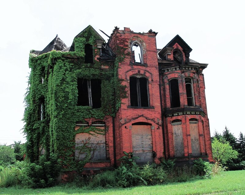 Abandoned red brick house