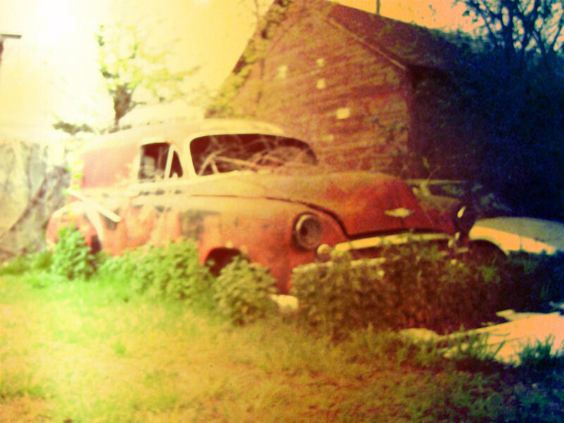 Abandoned Red Car — Decayed