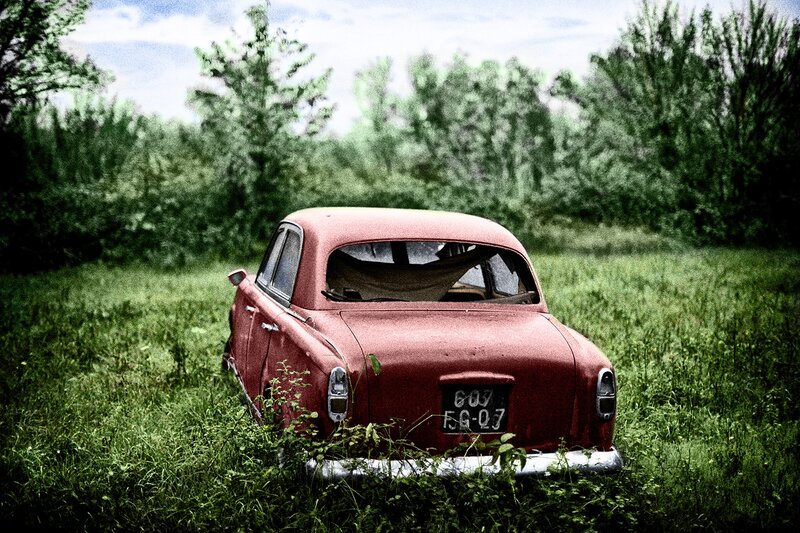 Abandoned Red Car — Desolate