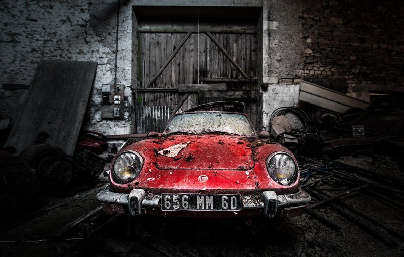 Abandoned Red Car — Dramatic, Photograph