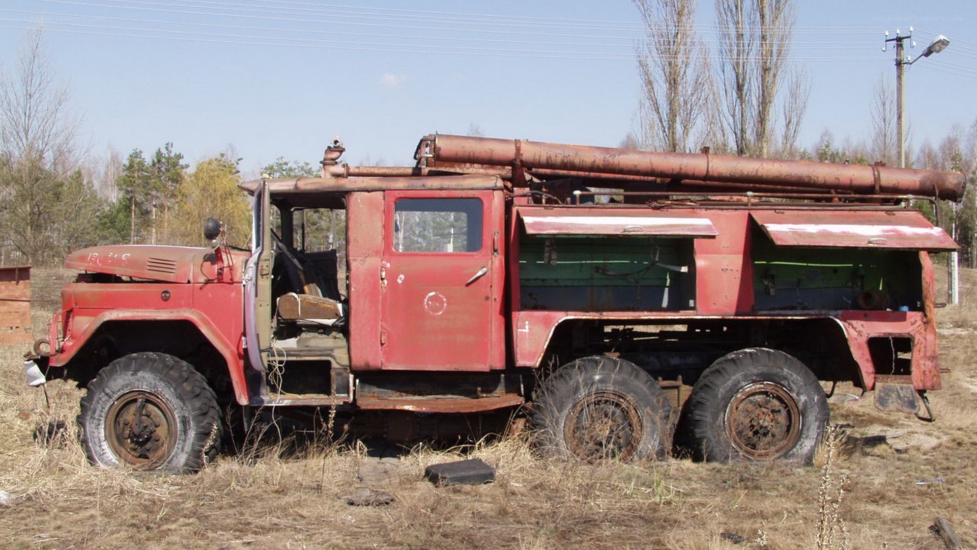 abandoned red fire truck