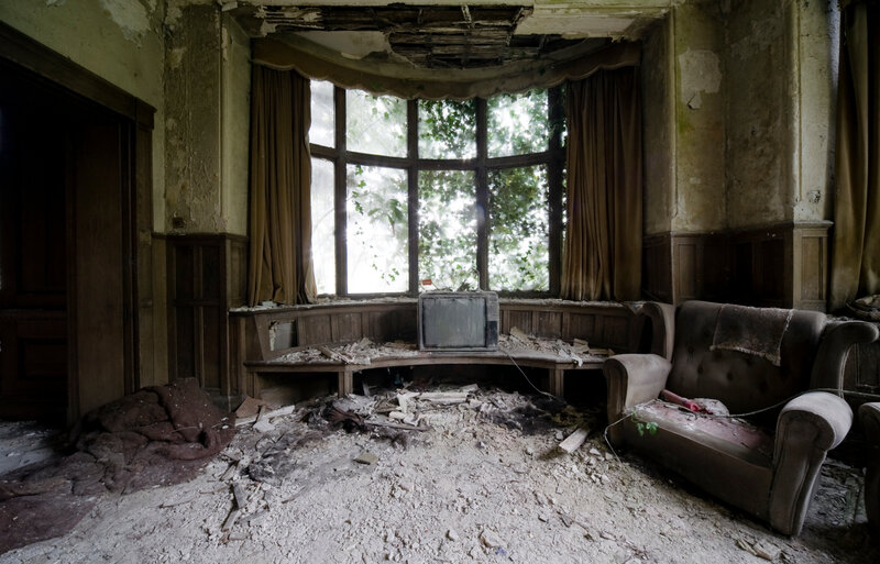 abandoned room with bay window