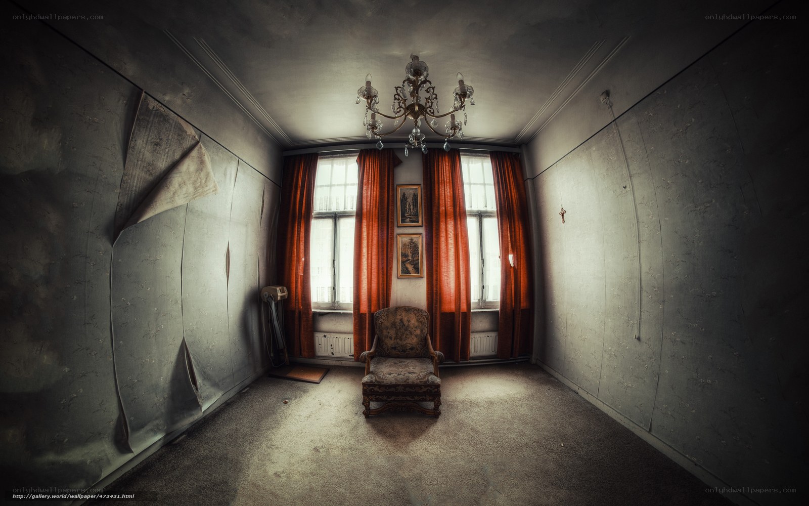 abandoned room with chandelier