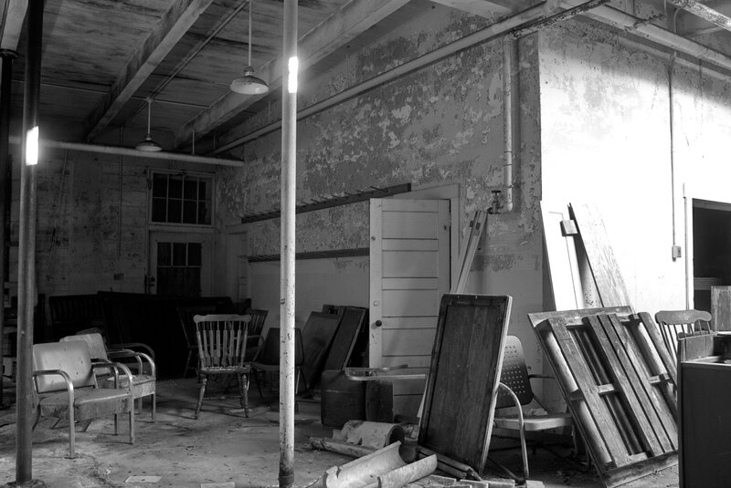 abandoned room with furniture