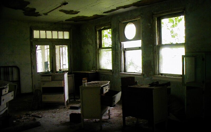 abandoned room with furniture