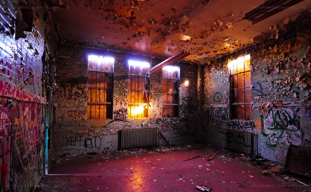 abandoned room with graffiti