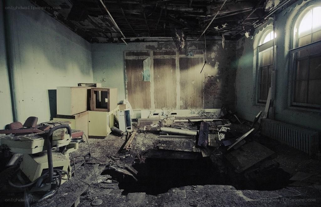abandoned room with hole in floor
