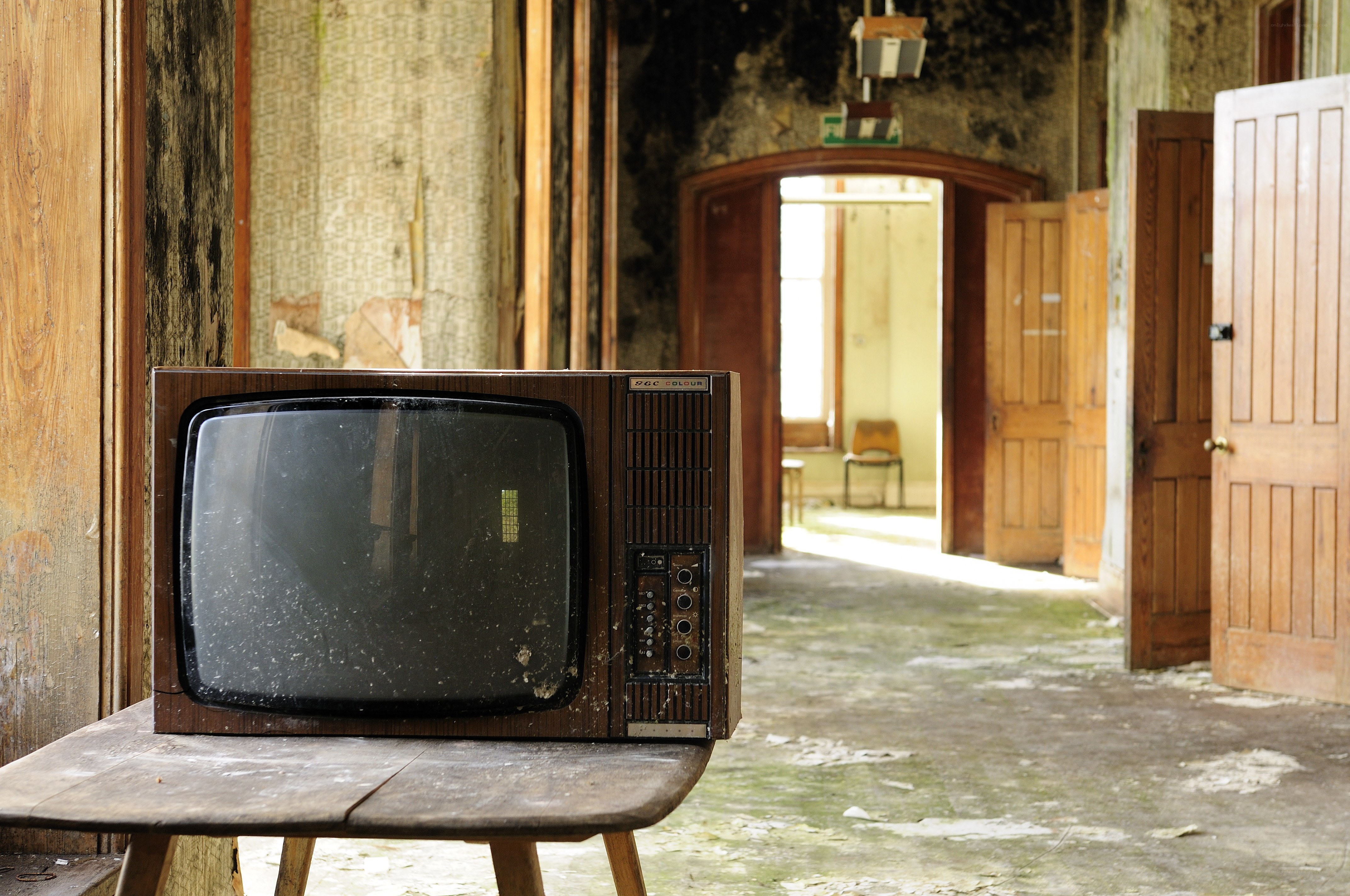 Abandoned room with old TV