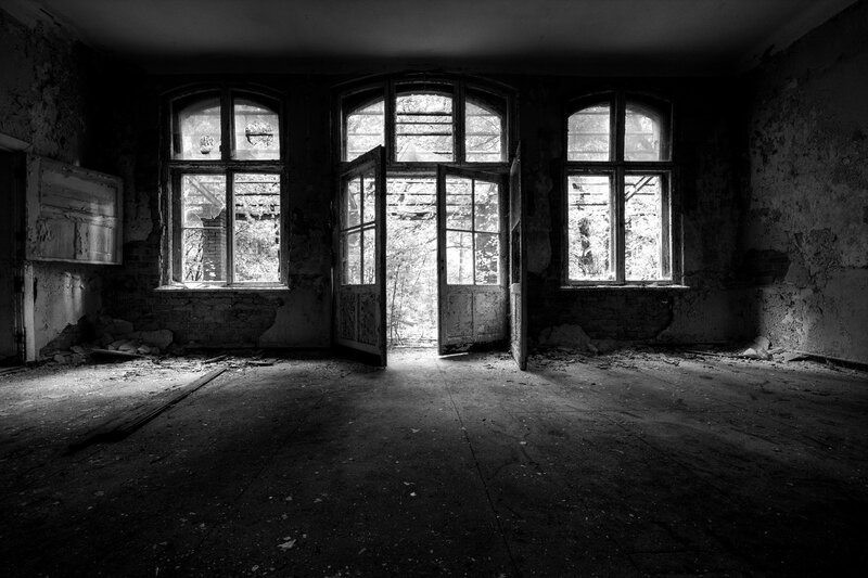 abandoned room with open door