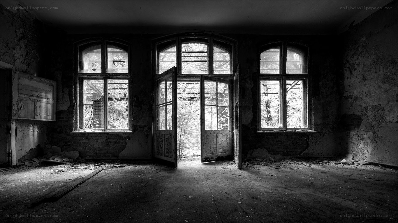 abandoned room with open doors