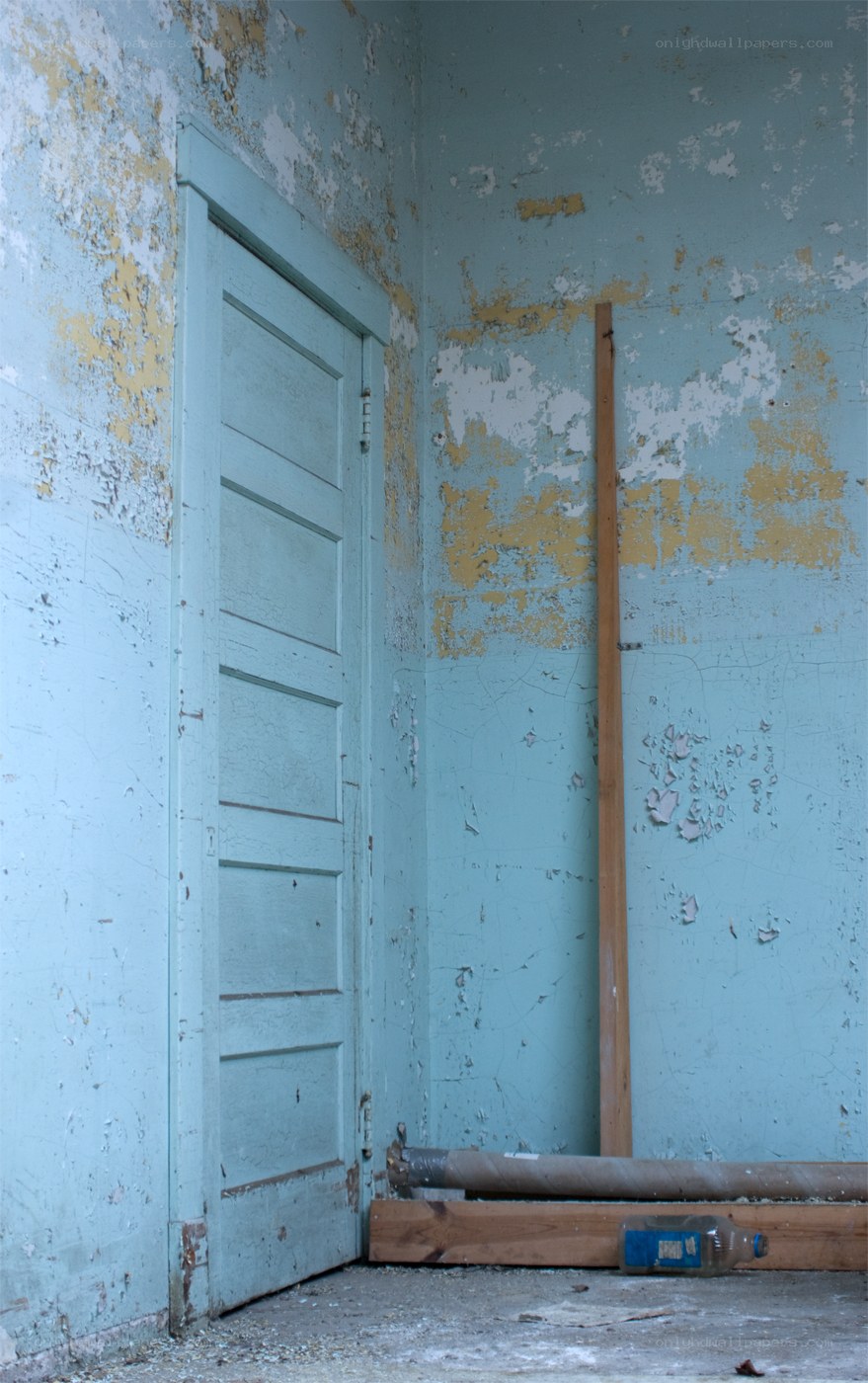 abandoned room with peeling paint