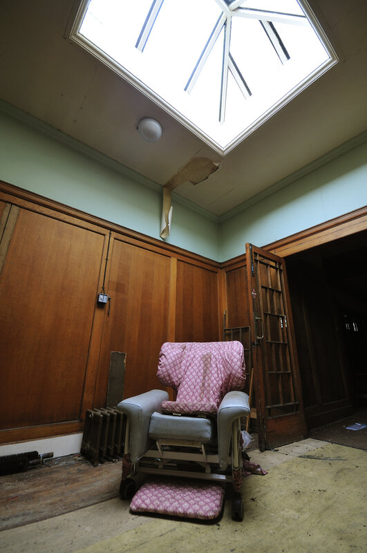 abandoned room with skylight