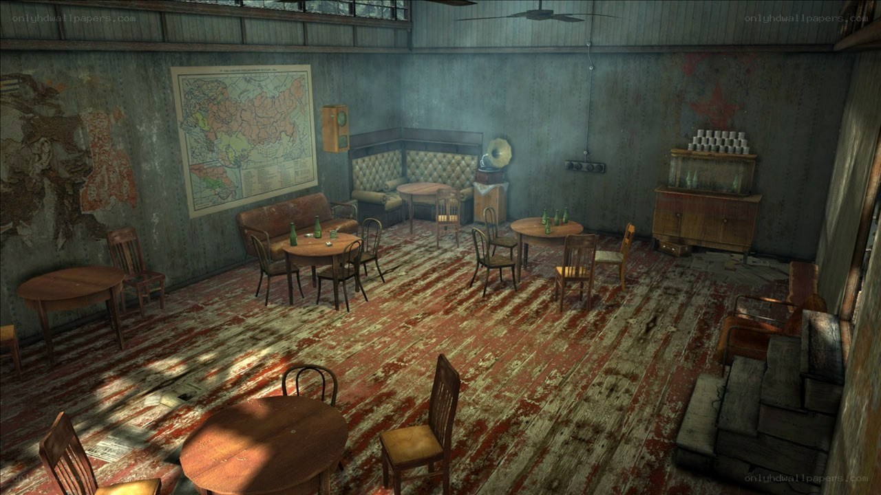 abandoned room with tables and map