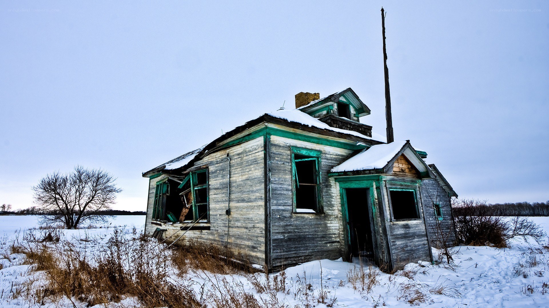 abandoned schoolhouse in winter