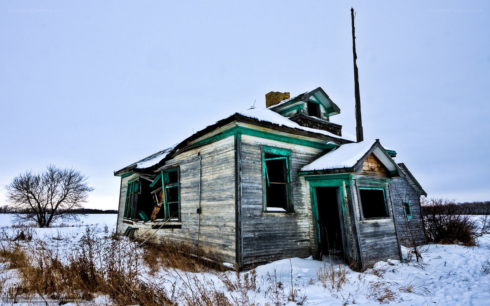 Abandoned schoolhouse in winter