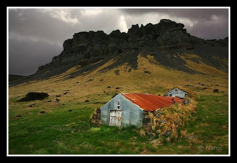 Abandoned shed in a mountain landscape