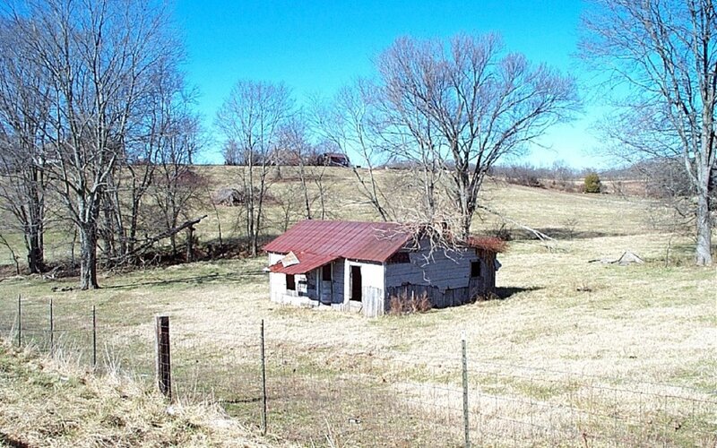 Abandoned Shed in Field — Blue