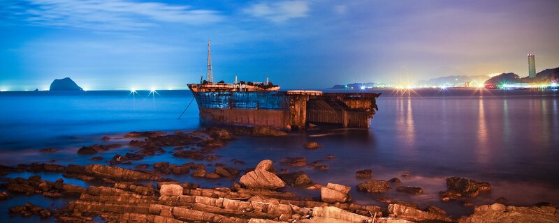 Abandoned ship at dusk