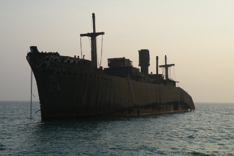 Abandoned ship in the sea