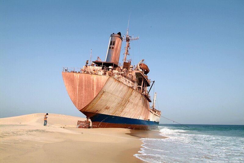 Abandoned Ship on Beach — Blue, Desolate