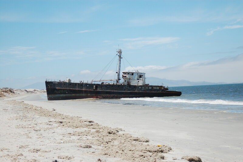 Abandoned Ship on Beach — Blue