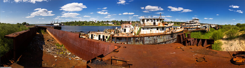abandoned ships on riverbank