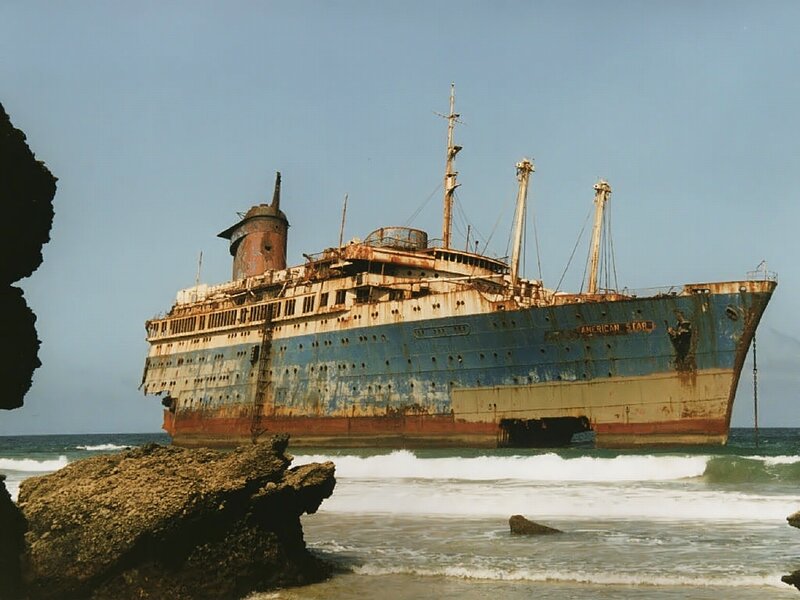 Abandoned Shipwreck — Blue, Dramatic, Afternoon, Photograph
