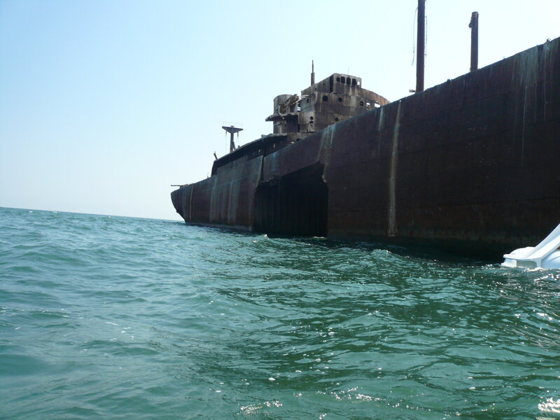 Abandoned shipwreck in the sea