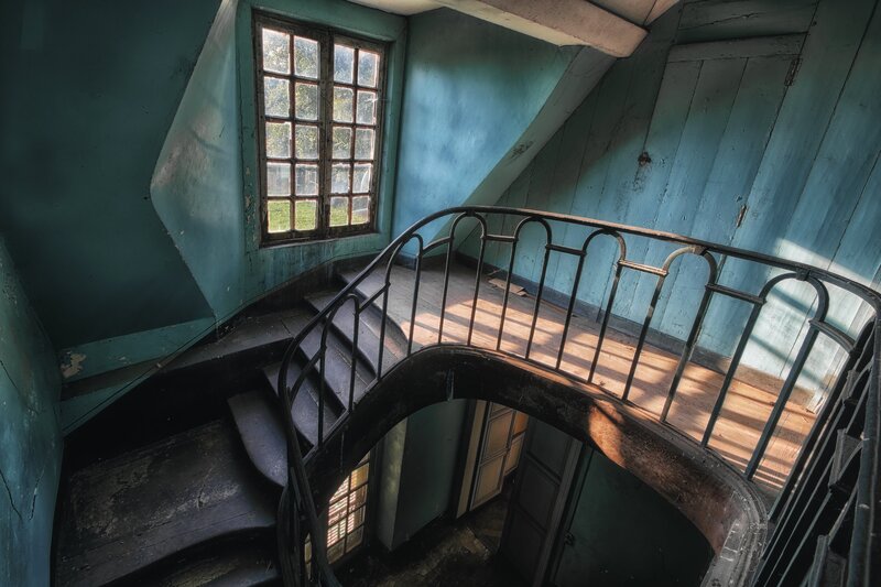 Abandoned Spiral Staircase — Blue
