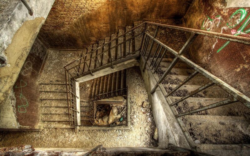 Abandoned Spiral Staircase — Brown