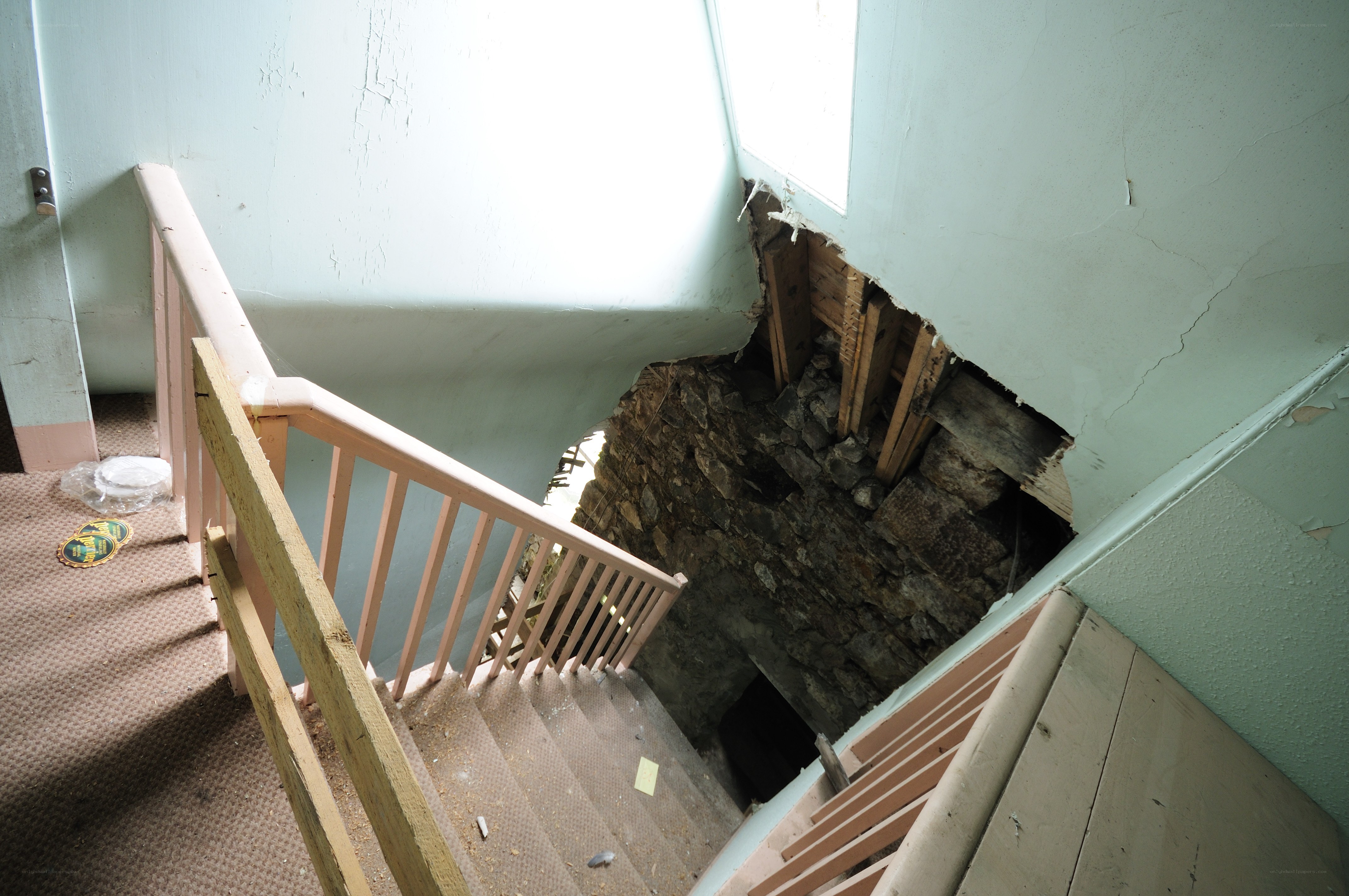 Abandoned staircase with structural damage