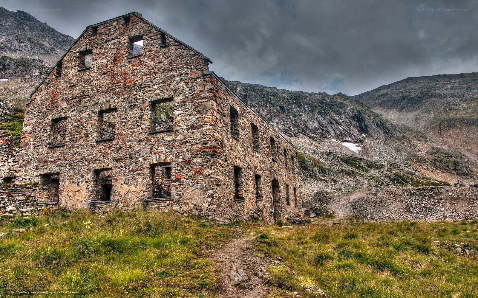 Abandoned stone building in mountains