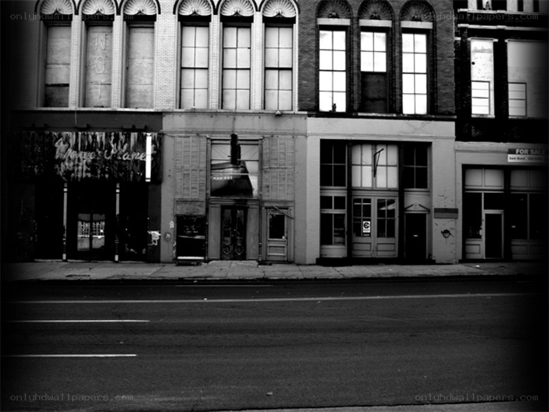 abandoned storefronts in black and white