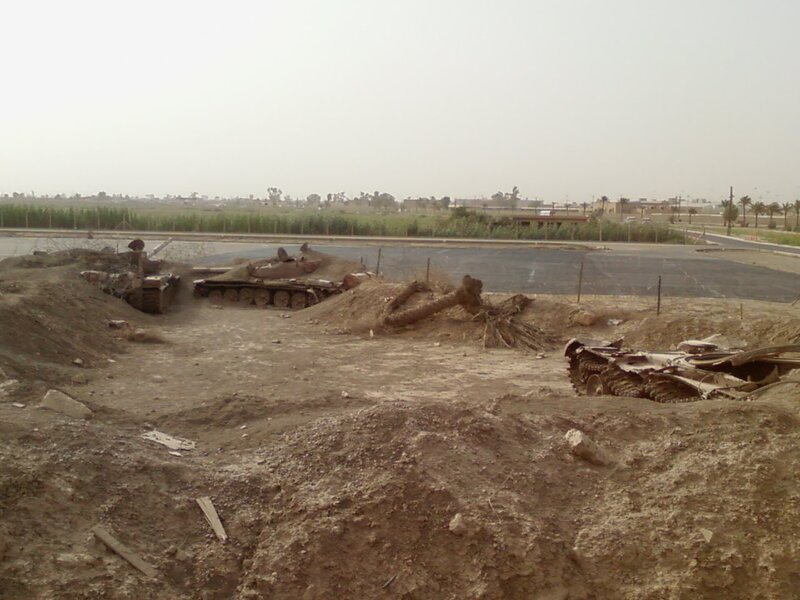 Abandoned Tanks in Desert — Brown, Desolate