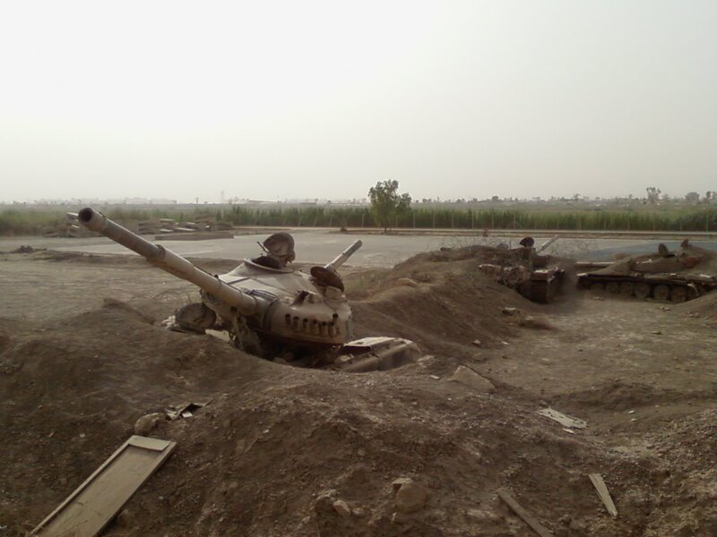 Abandoned Tanks in Desert — Brown