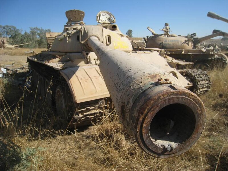 Abandoned Tanks in Field