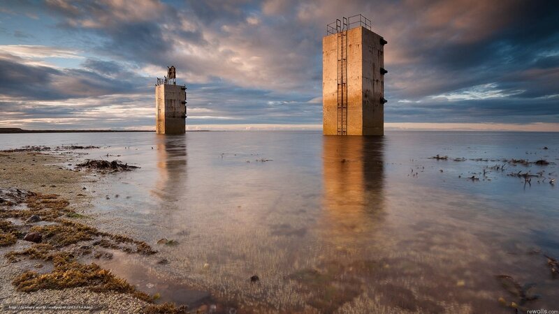 Abandoned towers in coastal waters