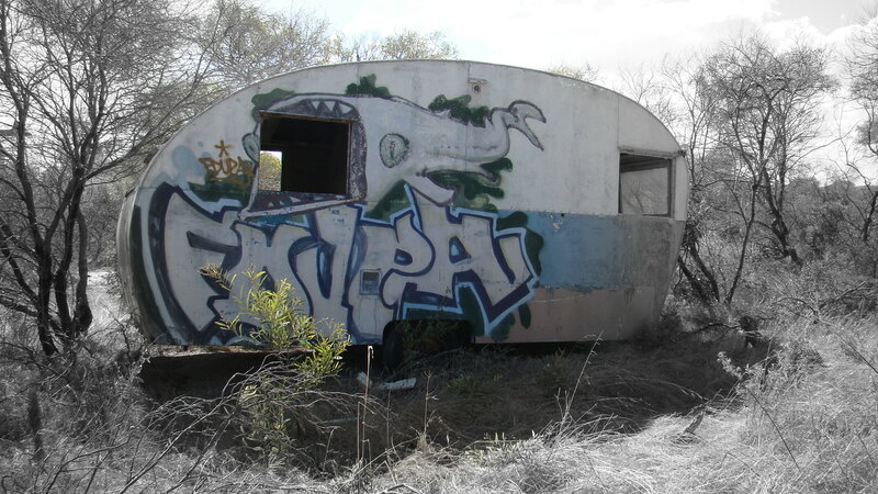 abandoned trailer with graffiti