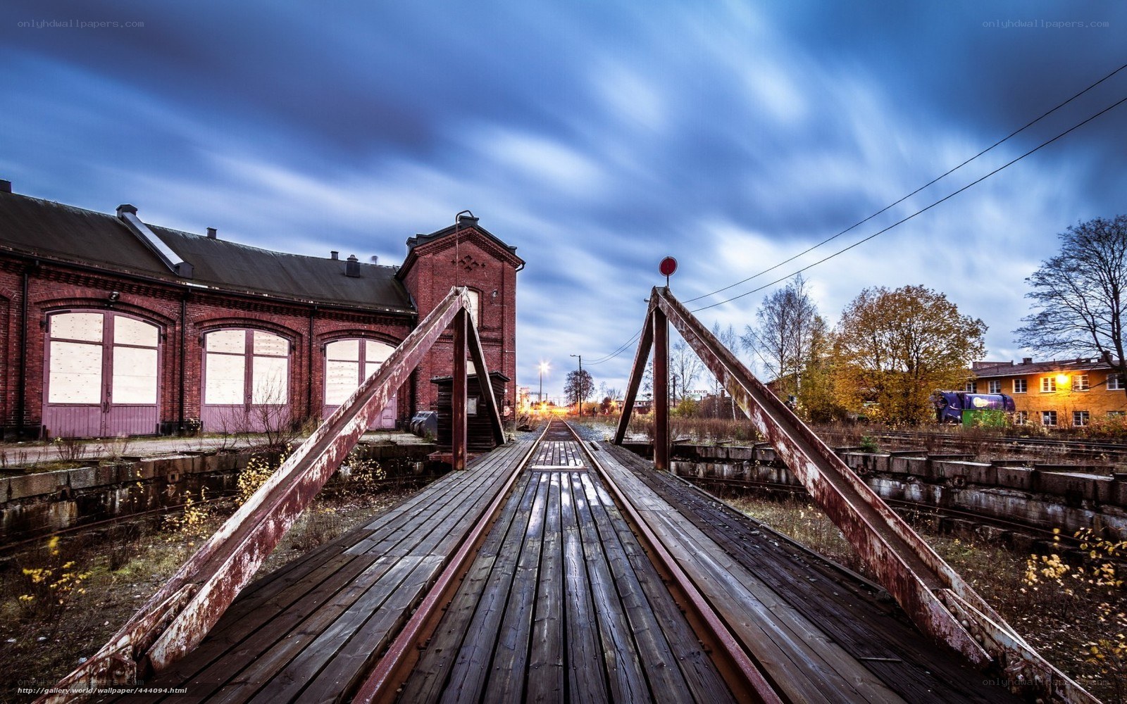 Abandoned train bridge at dusk